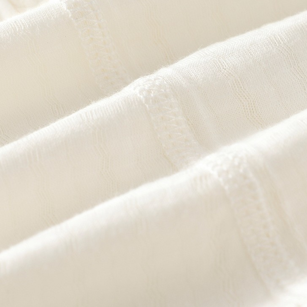 Cream Cloud Sleeveless Baby Bodysuit