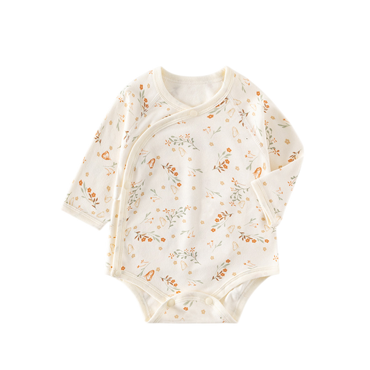 Baby bodysuit with floral pattern on a white background