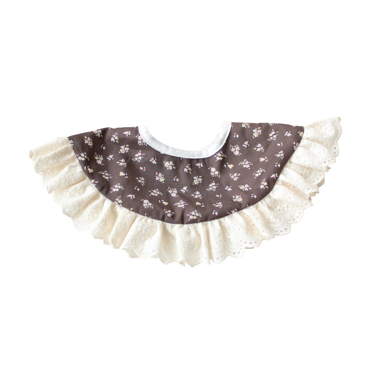 Baby bib with floral pattern and ruffled edge on a white background
