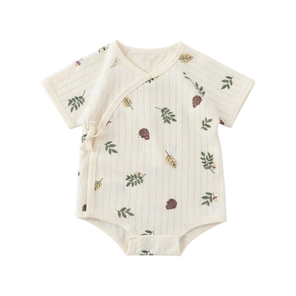 Cream short-sleeve wrap baby bodysuit with green leaf and brown botanical print