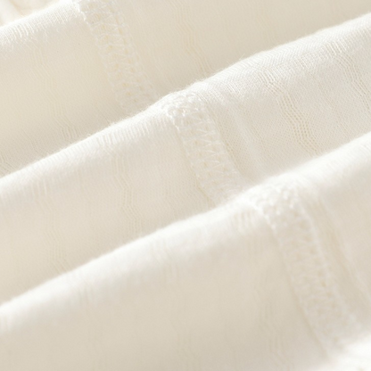 Cream Cloud Sleeveless Baby Bodysuit