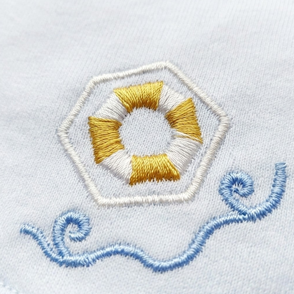 Ocean Sailboat Baby Bib styled product image