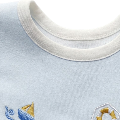 Ocean Sailboat Baby Bib styled product image, view 2