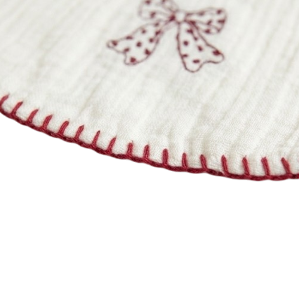Red and White Bow Baby Bib styled product image, view 2