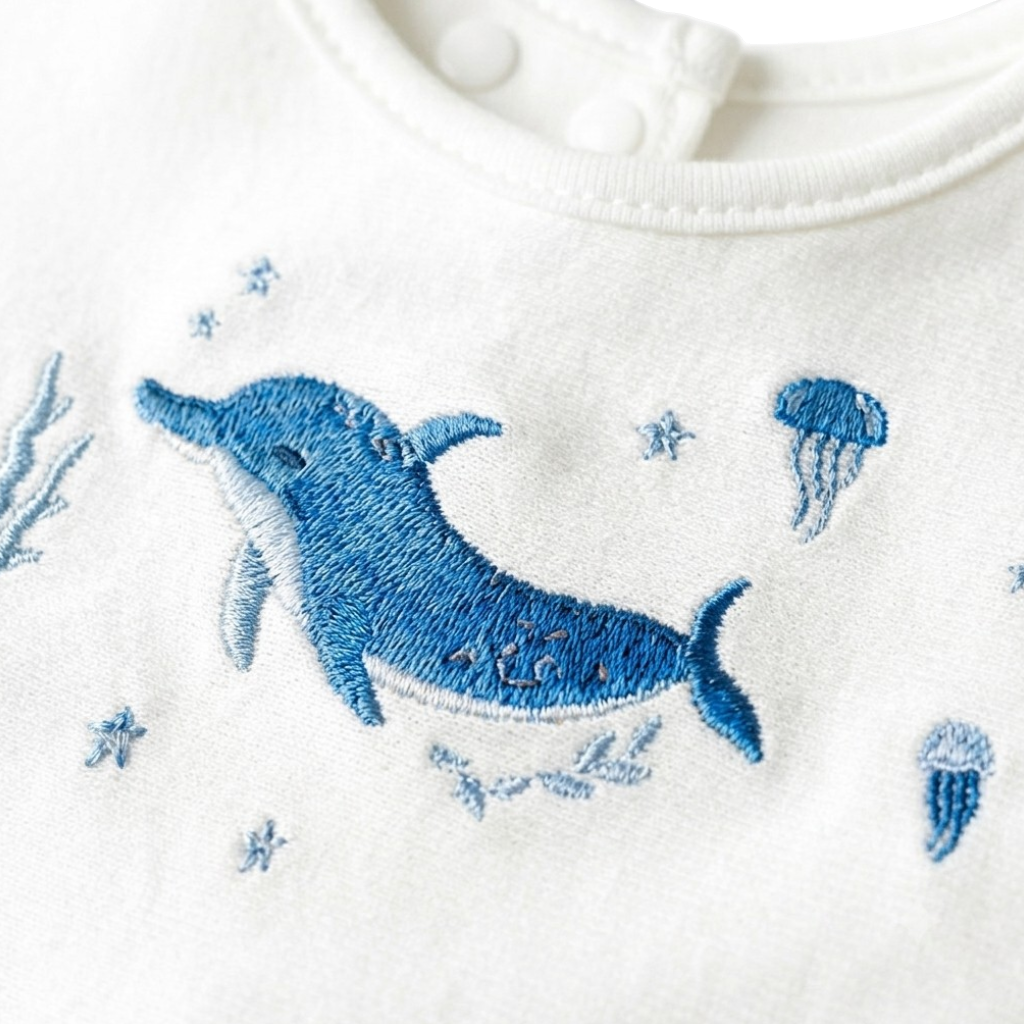 Ocean Dolphin Baby Bib styled product image, view 2