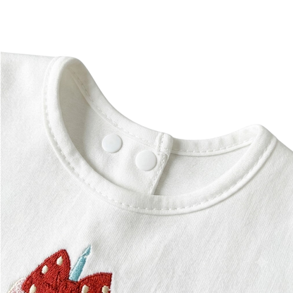 Bow Birthday Cake Baby Bib styled product image, view 3