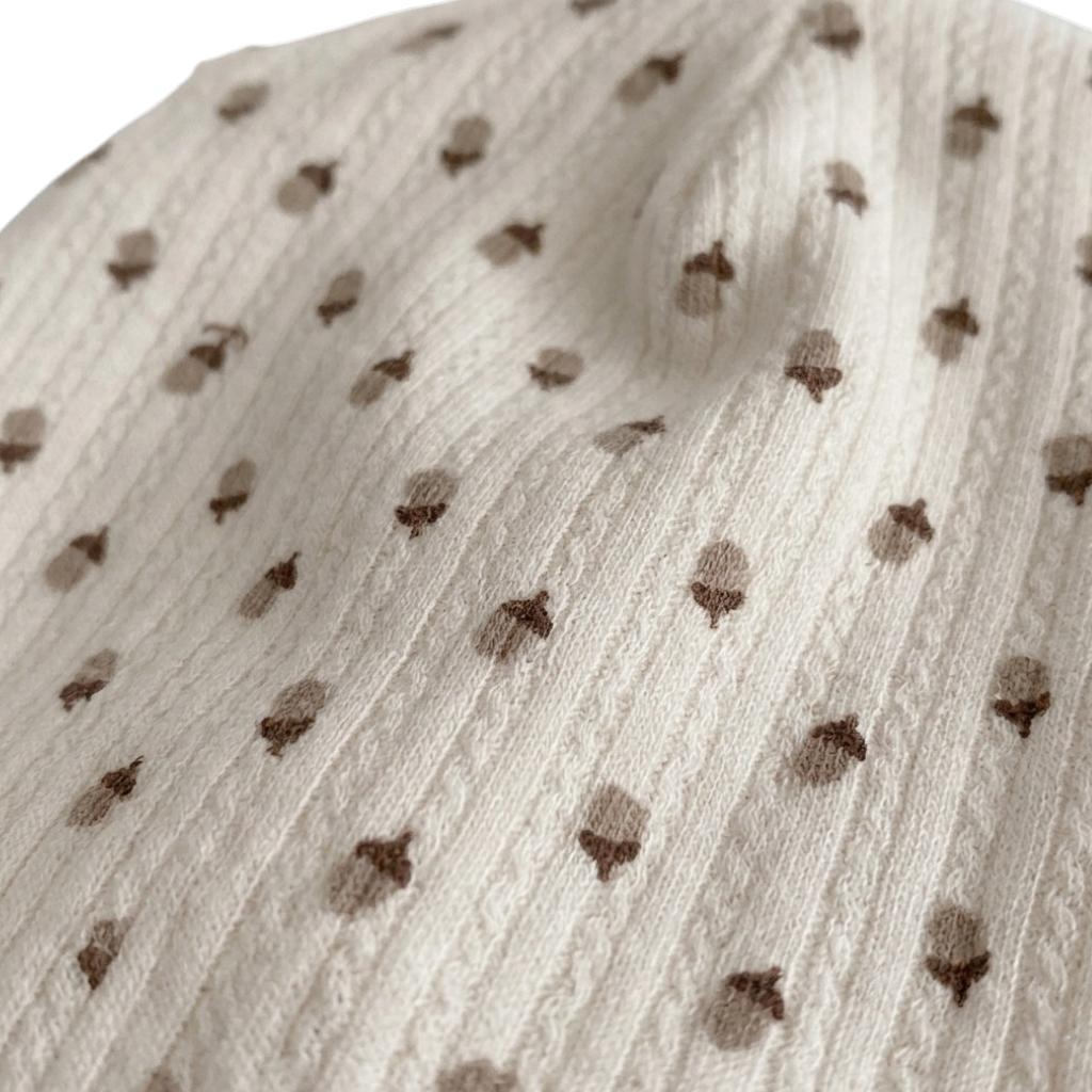 Pine Nut Baby Hat styled product image, view 2