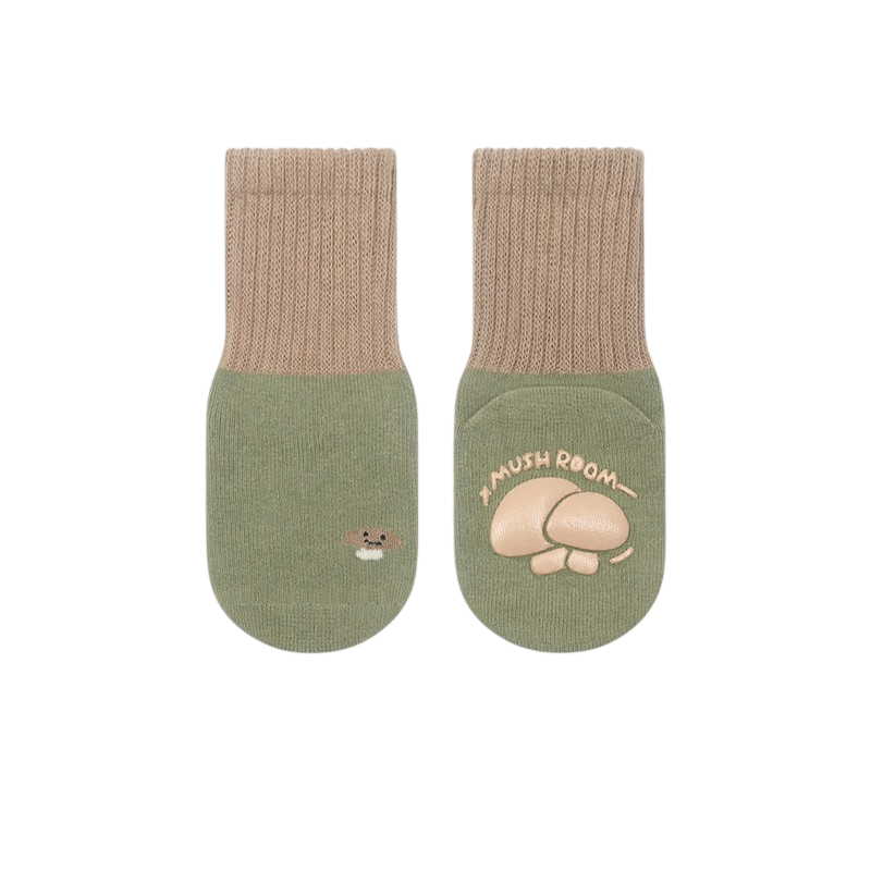 Pair of green socks with mushroom design on a white background