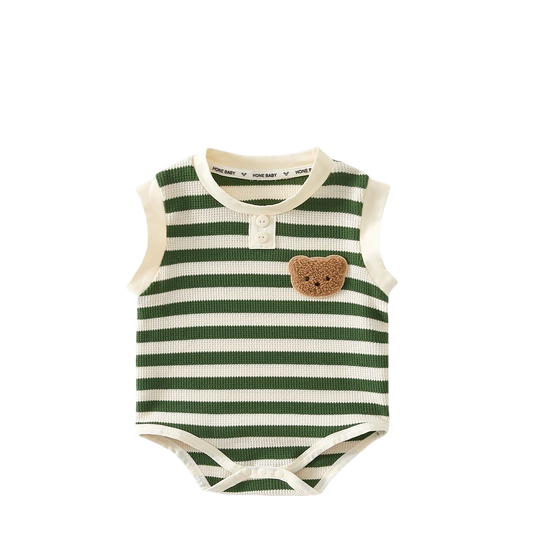 Green and white striped baby romper with a bear patch on a white background