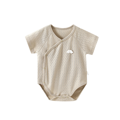 Beige baby bodysuit with a small logo on a white background