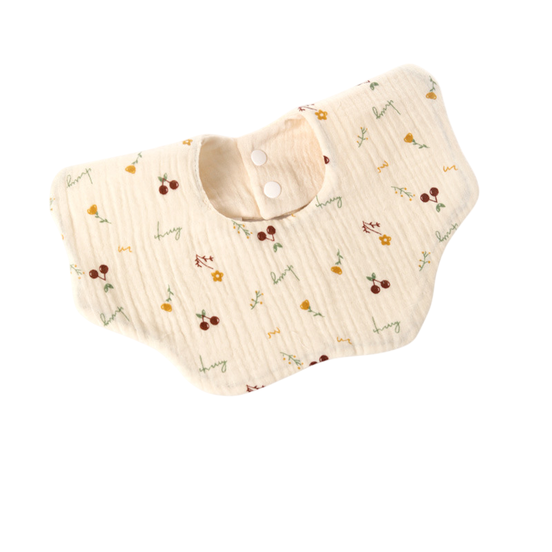 Beige baby bib with floral pattern on a white background
