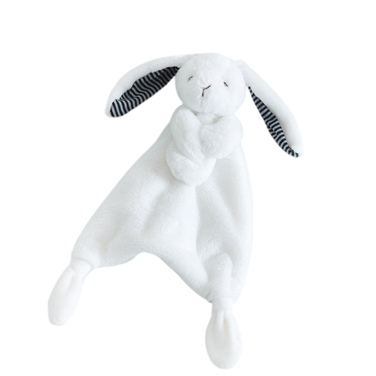 White plush bunny toy with black striped ears on a white background