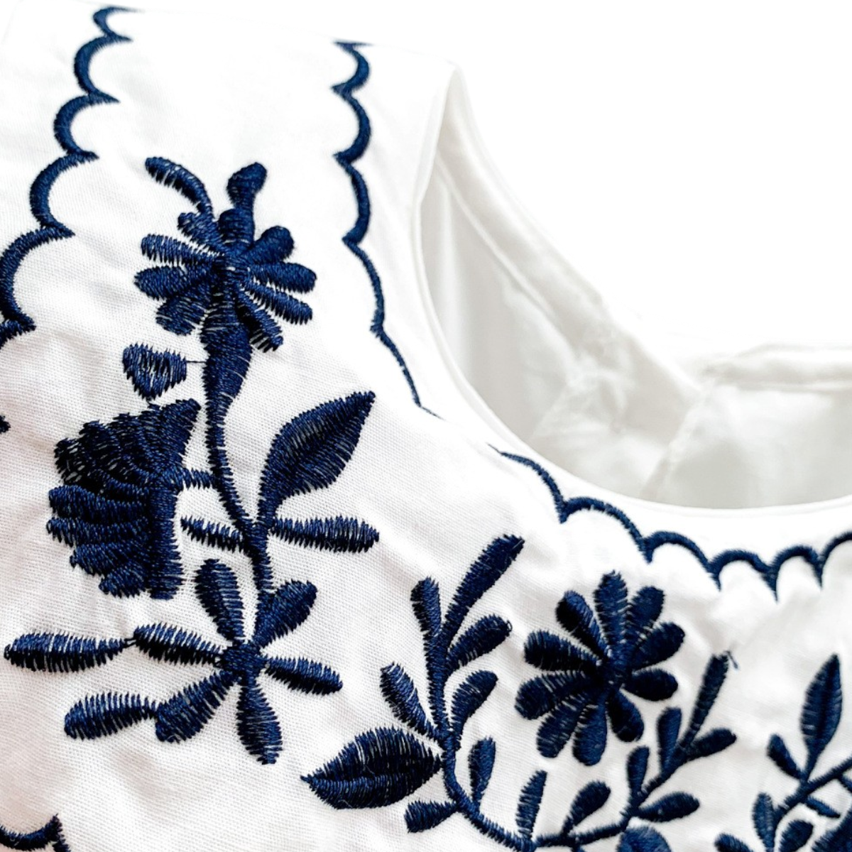 White Embroidered Nautical Baby Bodysuit on a white background, view 3