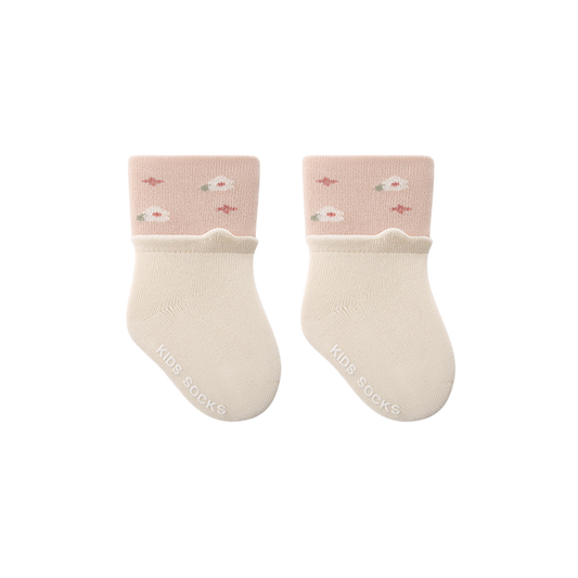 Pair of baby socks with pink tops and white cuffs on a white background