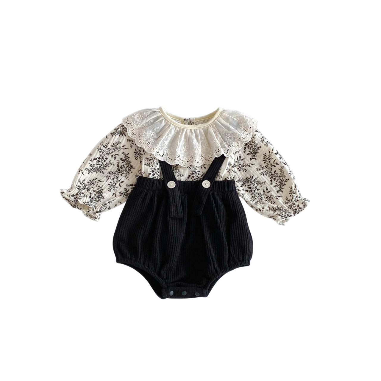 Black baby romper with floral lace sleeves on a white background