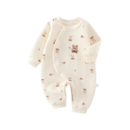 Baby romper with teddy bear pattern on a white background